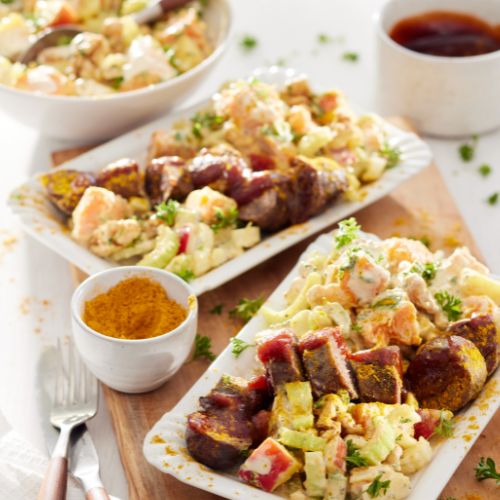 BBQ kerrieworst met zoete aardappelsalade